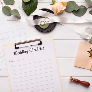 wedding-checklist-and-accessories-on-white-wooden-2023-11-27-04-55-28-utc